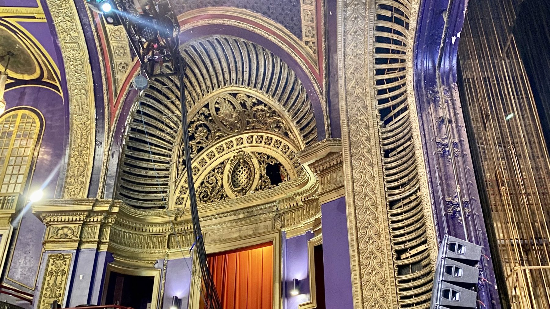 Art Deco cinema lobby with geometric ceiling detail